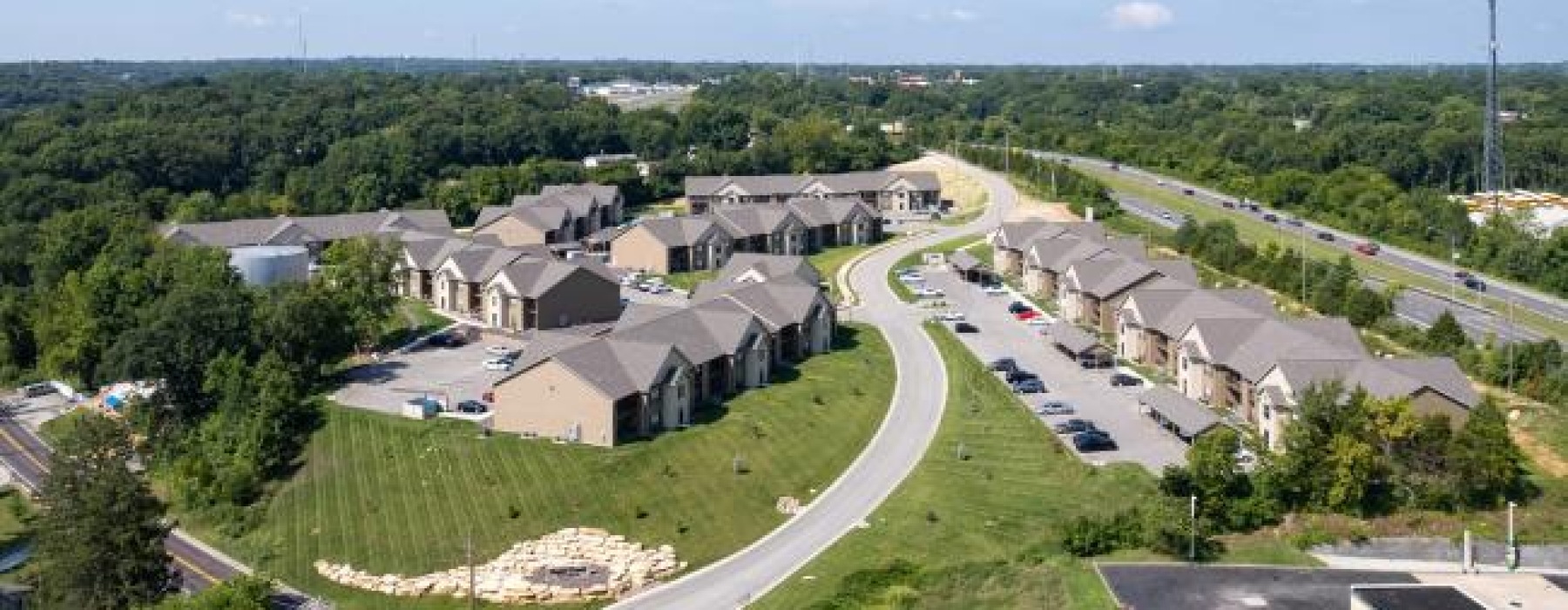 a road with houses and trees